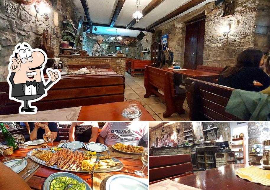 Dai un'occhiata agli interni di Konoba Ive