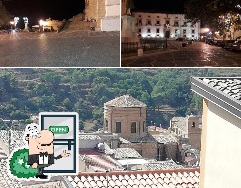 Puoi goderti l'aria fresca da seduto all'esterno di La Locanda