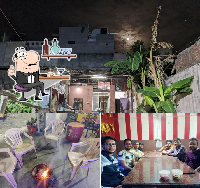 Take a seat at one of the tables at UP 14 Restaurant & FOOD POINT