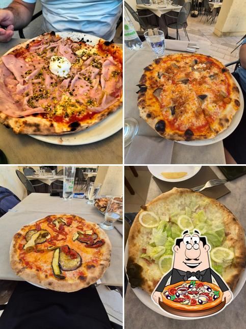 A Ristorante Pizzeria Matera Annunziata 1735 - Centro Storico, puoi assaggiare una bella pizza