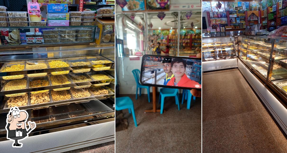 Take a seat at one of the tables at Shree Bikaner Misthan Bhandar