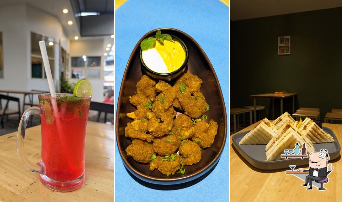 Take a seat at one of the tables at JC Shawarbica Areekode