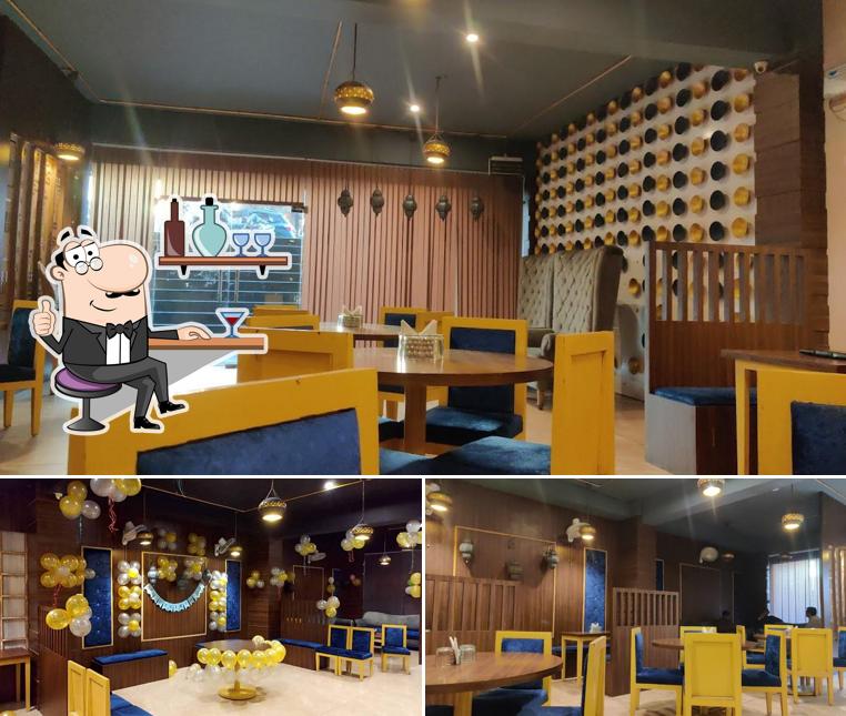 Take a seat at one of the tables at DOSA DARBAR