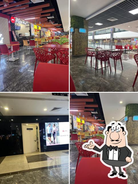 Take a seat at one of the tables at KFC
