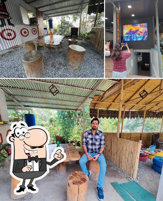 Take a look at the photo showing interior and beverage at Highway Kings Restaurant N Cafe