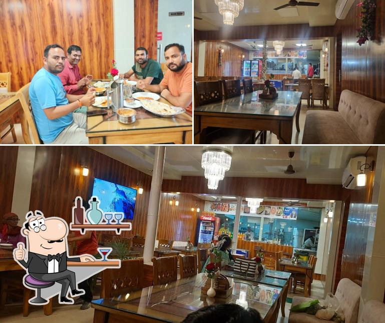 Take a seat at one of the tables at THE TAWA RESTAURANT