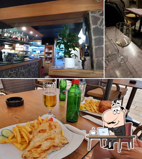 Guarda la immagine che mostra la interni e bancone da bar di Riviera