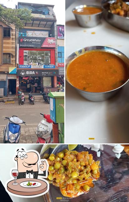 This is the photo displaying food and exterior at Pooja Bhojnalay