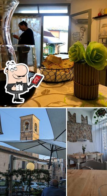 Curiosa tra l'area esterna di Trattoria La Merenda