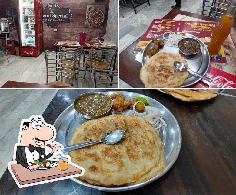 Take a look at the picture depicting food and interior at Oberoi Special Chana Bhatura