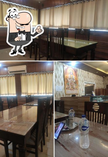 Take a seat at one of the tables at Quality Foods