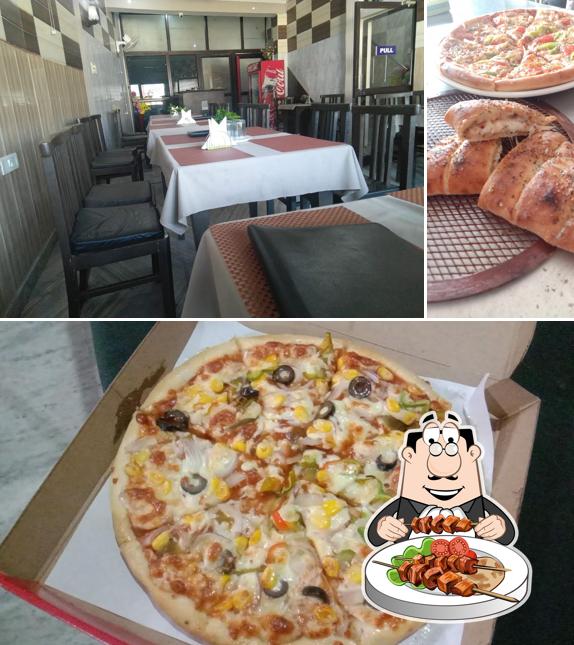 Among different things one can find food and interior at pizza house Restaurant