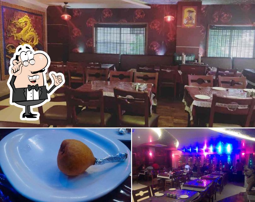 Take a look at the image showing interior and food at Taipan Chinese Restaurant