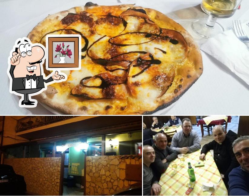 La immagine della interni e pizza di Ristorante Il Focolaio