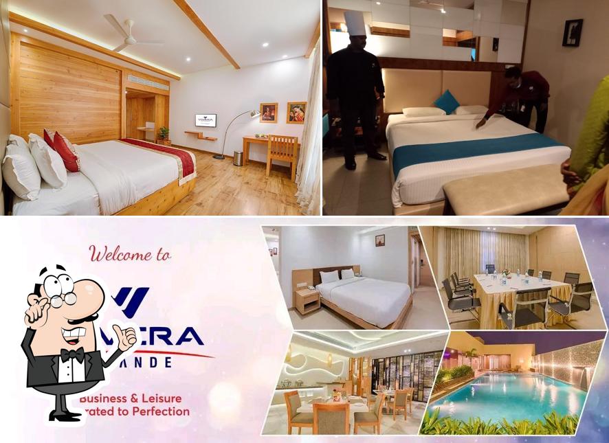 Take a seat at one of the tables at Vivera Grande (Hotel)