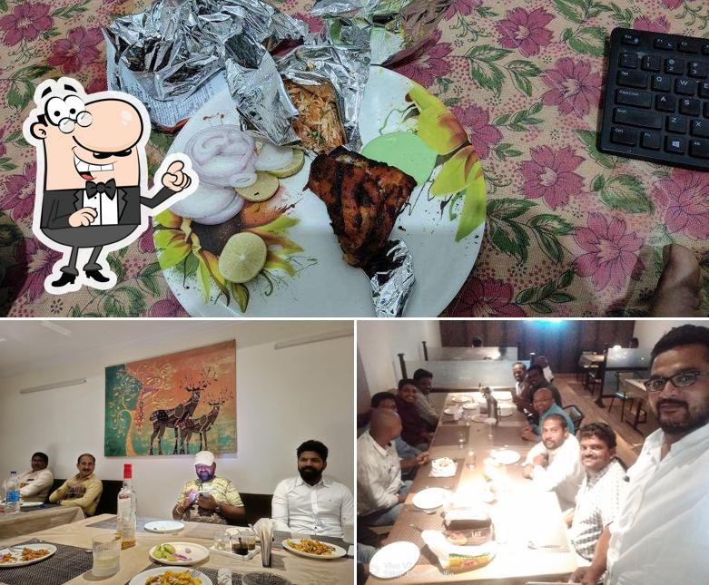 Take a look at the picture showing interior and food at Sitara family restaurant