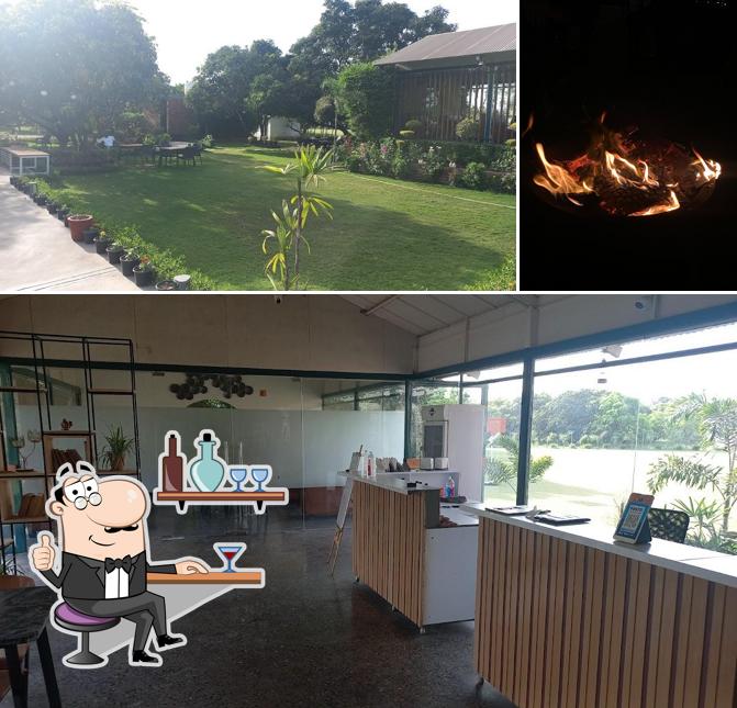 This is the image depicting interior and food at Suramya Cafe & Restaurant