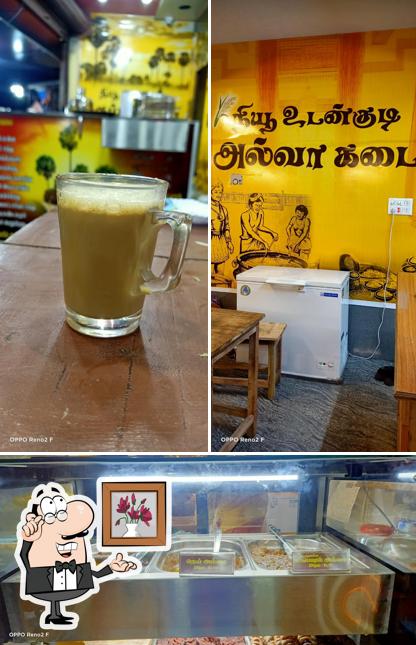 This is the photo showing interior and beverage at NEW UDANKUDI KARUPATTI COFFEE