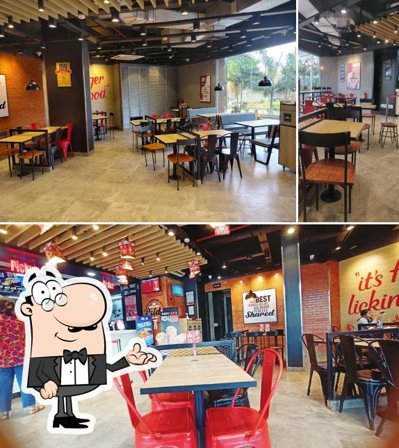 Take a seat at one of the tables at KFC