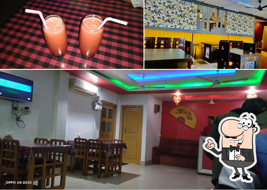 The photo of interior and beverage at Chilli's Family Restaurant