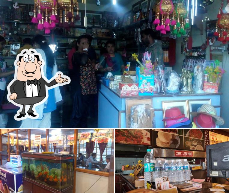 Take a seat at one of the tables at Maddur Tiffanys @ shivapura