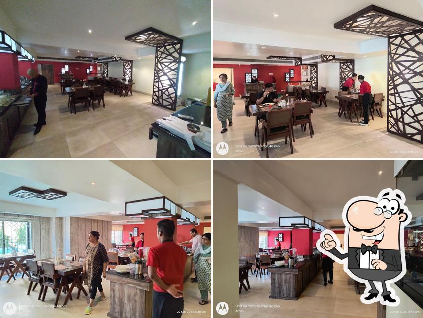 Take a seat at one of the tables at saffron multi- cuisine restaurant