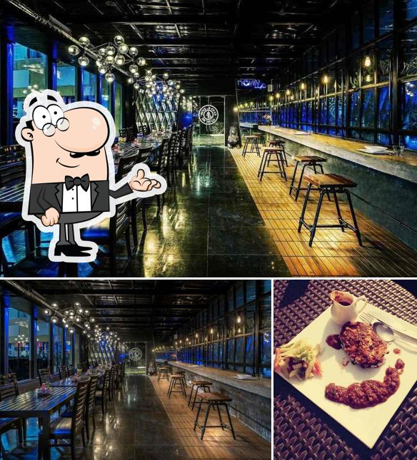 Take a seat at one of the tables at 3 And Half Bistro