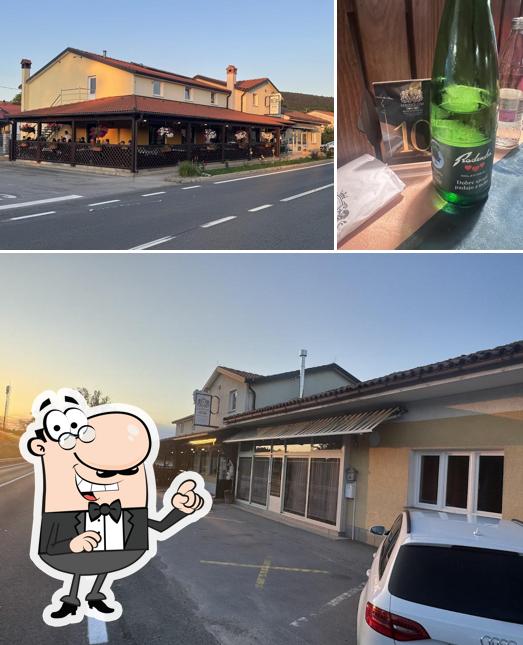 Guarda la immagine che mostra la esterno e bevanda di Restaurant CIMI
