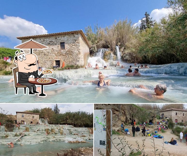 Curiosa tra la parte esterna di Cascate del Mulino di Saturnia