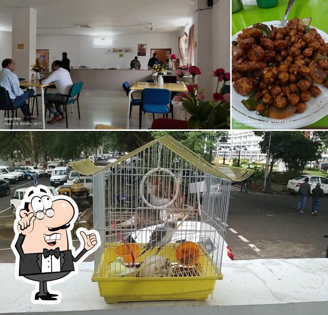 Take a seat at one of the tables at Johar Canteen