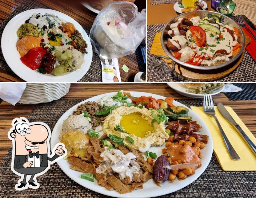 Questa è la immagine che presenta la interni e cibo di Vegano