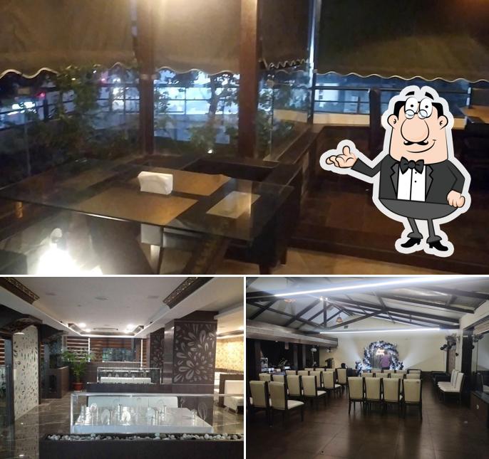 Take a seat at one of the tables at Shri Prathvilok