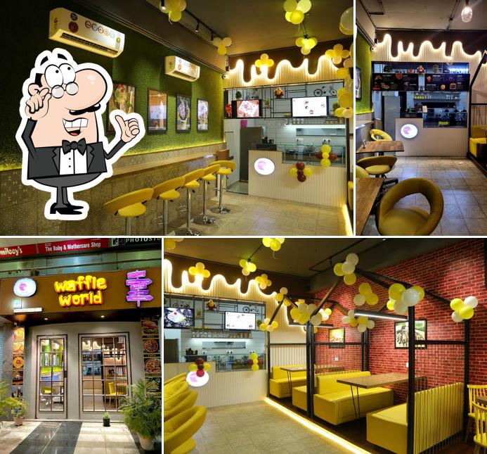 Take a seat at one of the tables at Waffle World