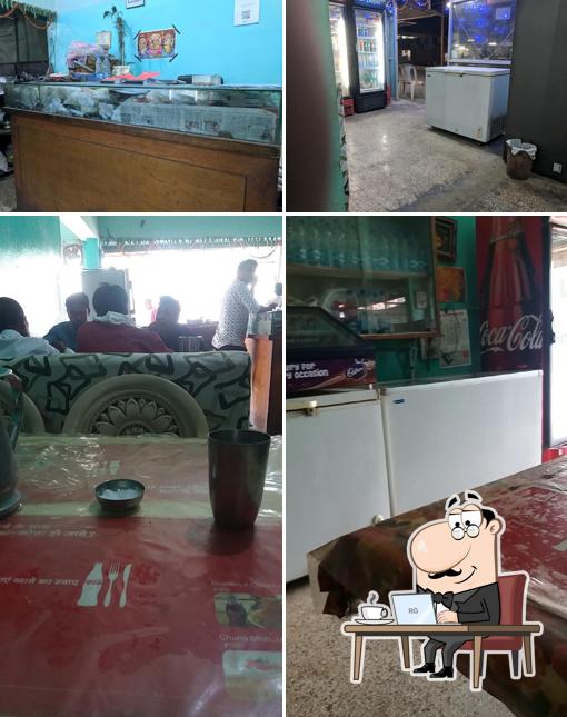 Take a seat at one of the tables at PUNJABI BHOJNALAY FAMILY DHABA