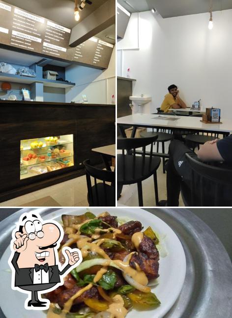 The image of Roll N Shake’s interior and food