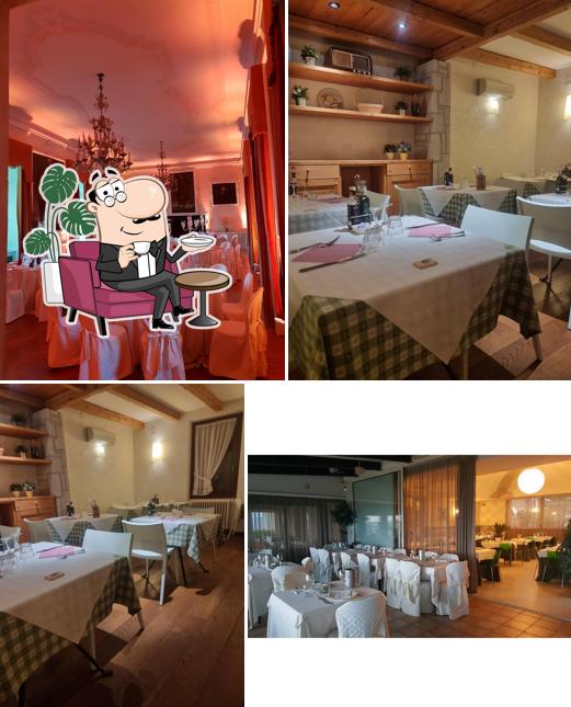 Siediti a un tavolo di Albergo Ristorante al Pescatore