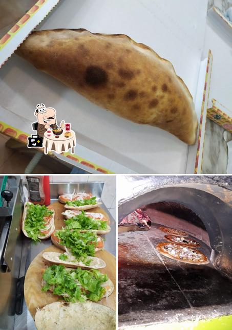 Questa è la immagine che mostra la cibo e esterno di Pizzeria la Pietra