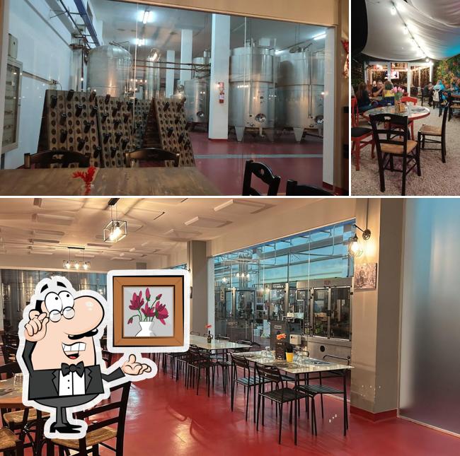 La immagine di interni e tavolo da pranzo da Clivus Burger & Wine Store