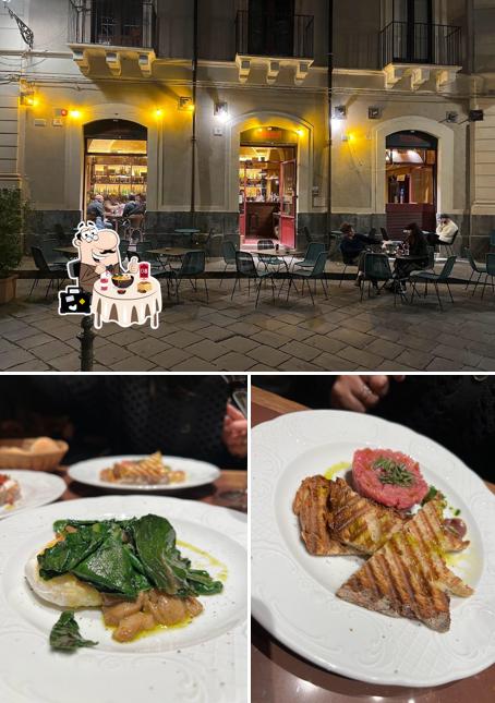 Tra le diverse cose da Enoteca Civita Enoteca Con Cucina si possono trovare la cibo e interni