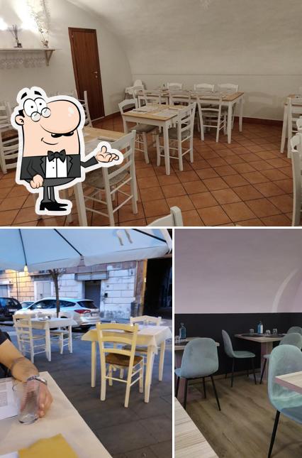 Dai un'occhiata agli interni di Pizzeria La borgata
