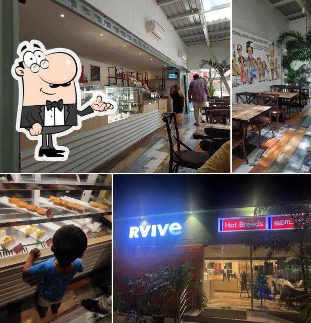 Take a seat at one of the tables at RVIVE Cafe by Hot Breads & Madras Coffee House