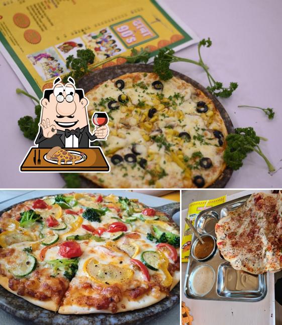Pick pizza at DHABA 90'S