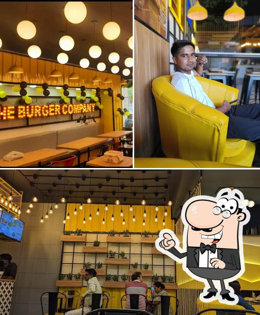 Take a seat at one of the tables at The Burger Company