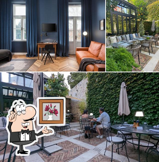 Dai un'occhiata agli interni di Corte Restaurant