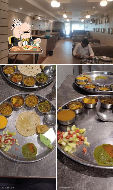 Check out the picture showing food and interior at Patel thal