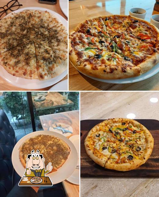 At The Fried Chicken Factory, you can taste pizza