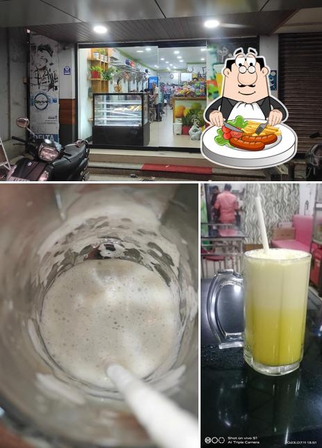 Take a look at the picture depicting food and interior at Delta Bakers and Fresh Juice