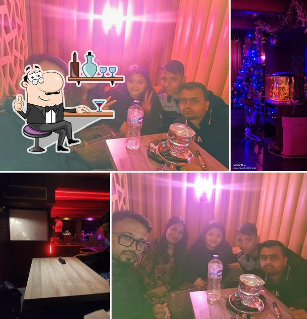 Take a seat at one of the tables at Zero Degree Cafe and Lounge Esplanade