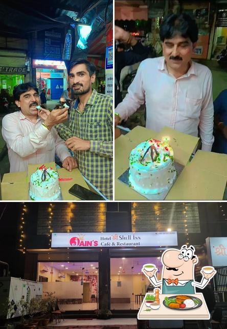 Take a look at the picture depicting food and interior at Jain cafe
