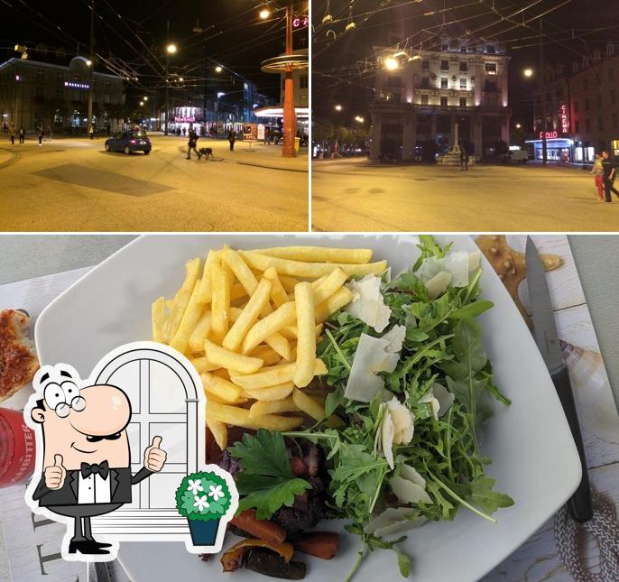 Questa è la foto che presenta la esterno e cibo di Restaurant Satriale’s